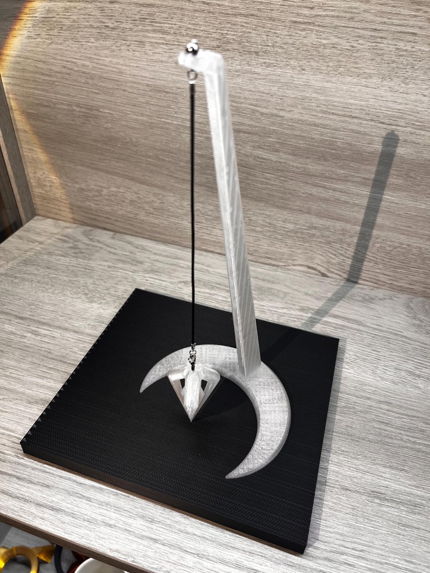 Frost Pendulum and Moon Stand
