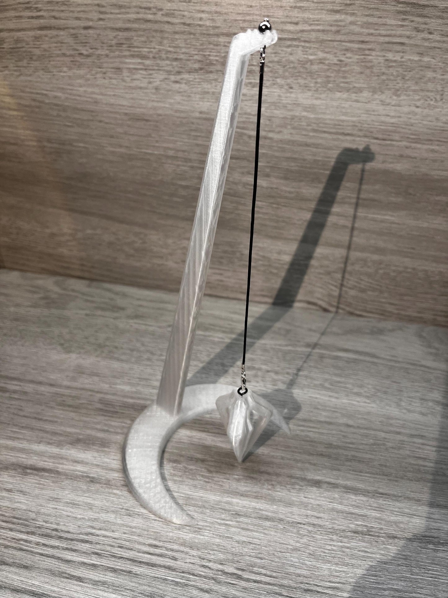 Frost Pendulum and Moon Stand